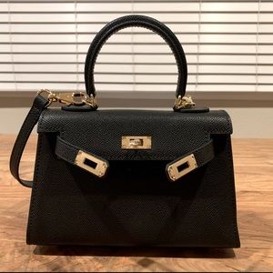 New leather crossbody (dupe) bag with lock and key.